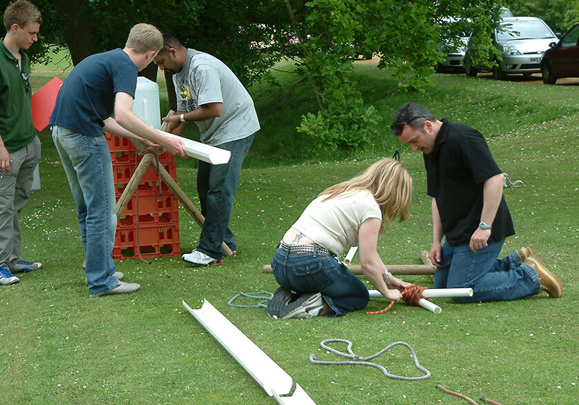 A group working together to overcome a plumbers nightmare task